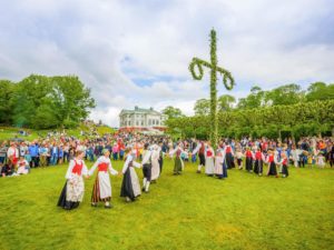 Dancing around the maypole is an essential part of the Swedish Midsummer's Day celebration.