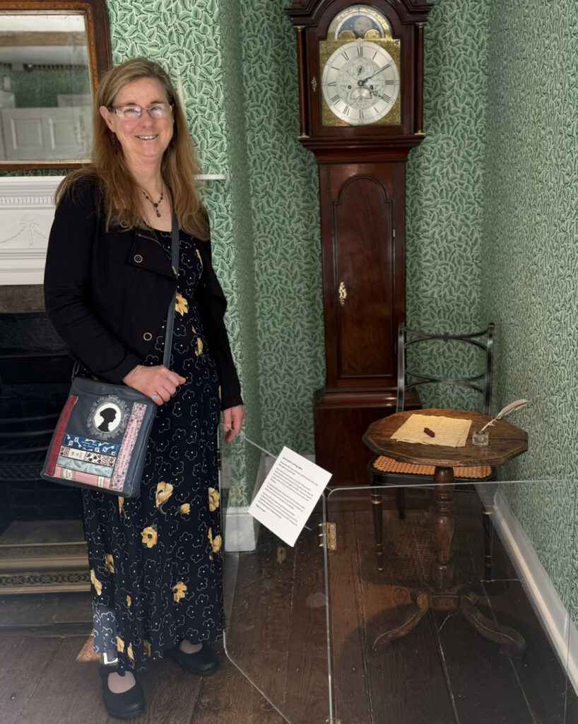 At Jane Austen’s House Museum with the famous desk where she wrote or rewrote all of her beloved novels!