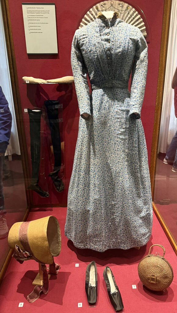 Charlotte Bronte's dress, bonnet, shoes, and reticule.