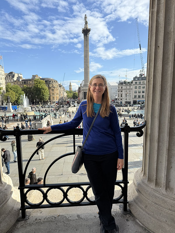 On the balcony of the National Gallery overlooking Trafalgar Square, London